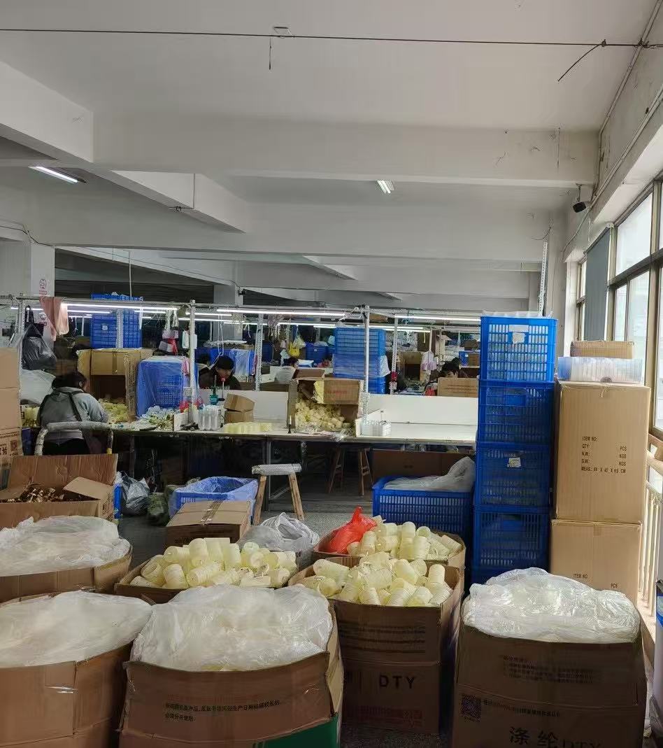 LED candle components and assembly workstations.